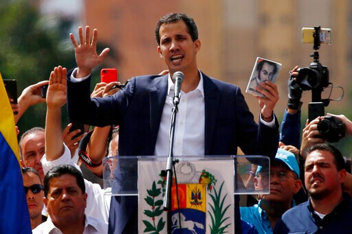 The Latest: Australia Weighs Recognizing Venezuela's Guaido