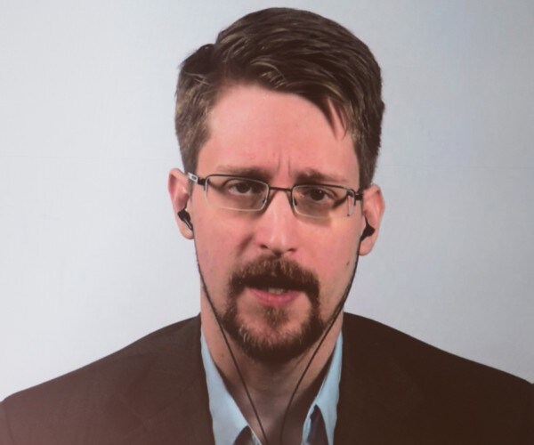 edward snowden speaks during a video conference