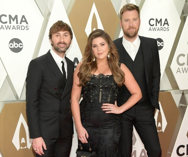 dave haywood, hillary scott and charles kelley of lady antebellum on red carpet
