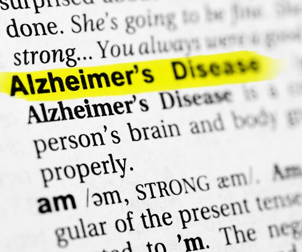 alzheimer's disease in a book highlighted in yellow