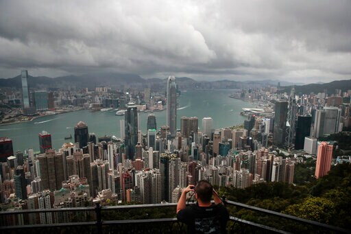 Hong Kong Economy Shrinks 4% under Anti-virus Controls