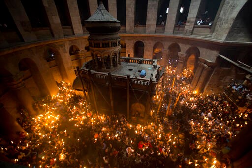 Holy Fire Ceremony in Jerusalem Draws Thousands