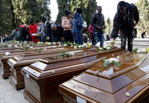 The Latest: Interfaith Ceremony for Drowned Nigerian Women