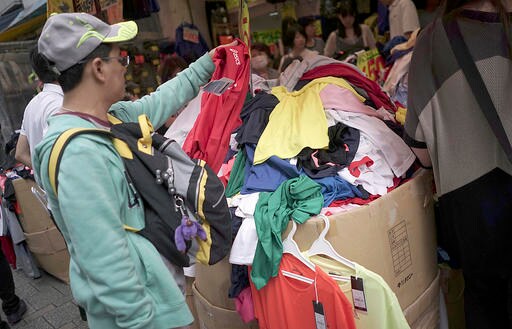 Japan Central Bank Adds Stimulus, Cites Global Uncertainties