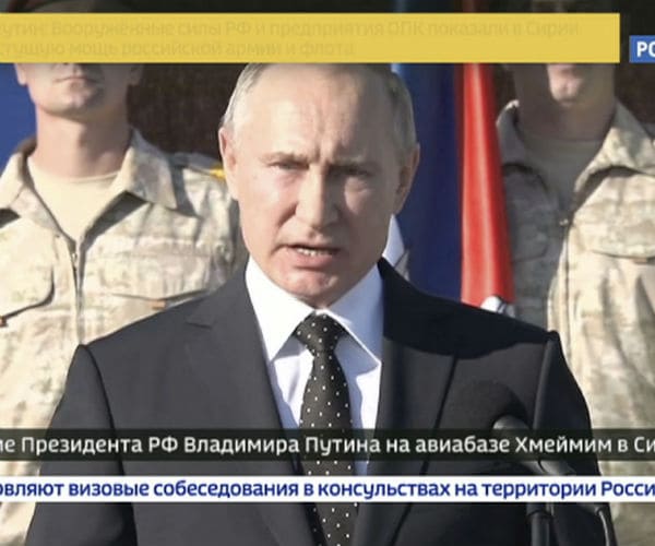 Putin Declares Victory on Visit to Air Base in Syria
