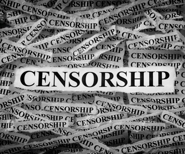 strips of newspaper with the word censorship typed on them