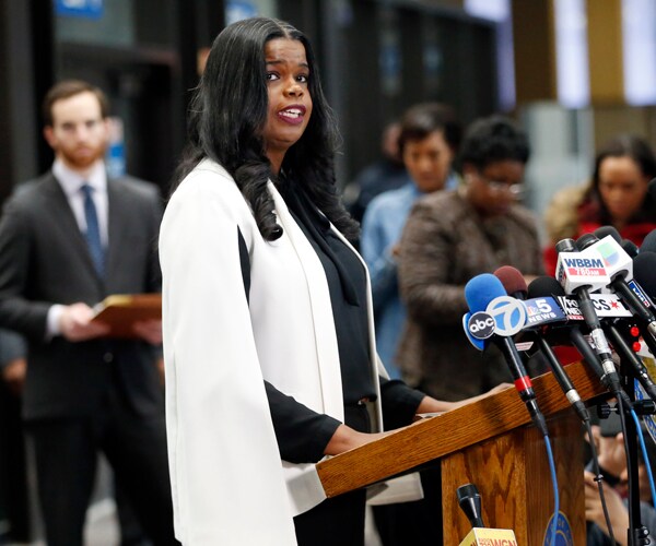kimberly foxx addresses the media