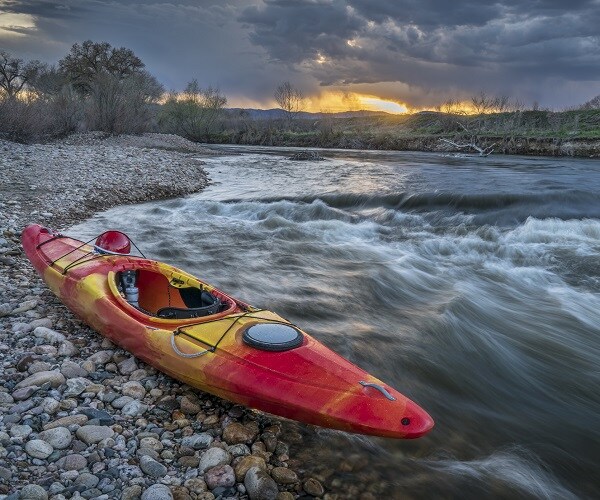 Grizzly Bear Chases After Passing Whitewater Kayaker