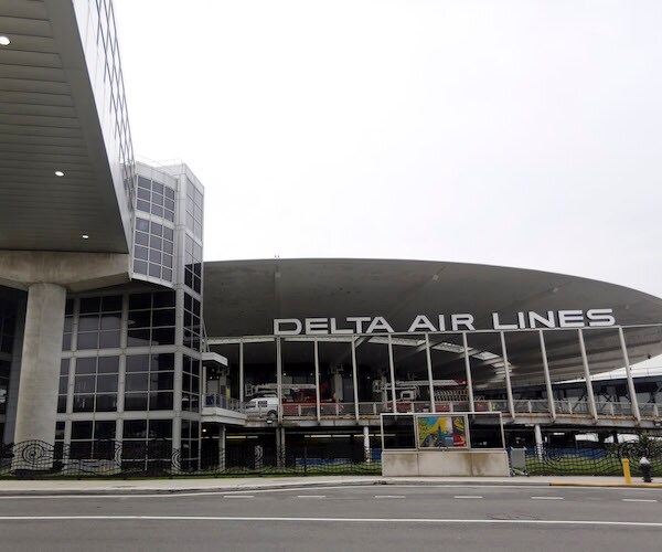 Fugitive Search at JFK Airport Sparks New Travel Ban Scare