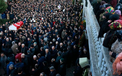 The Latest: Turkey Premier Slams US for Backing Syrian Kurds