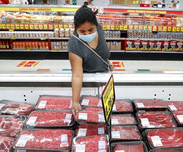 shopper wearing mask while shopping