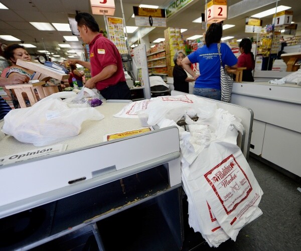 plastic bags at checkout counter in local grocery store