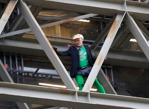 Climate Protester in Boris Johnson Garb Scales Big Ben Tower