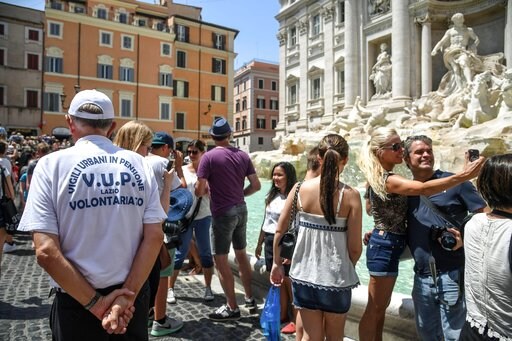 Retired Police Go on Tourist Patrol at Rome's Trevi Fountain