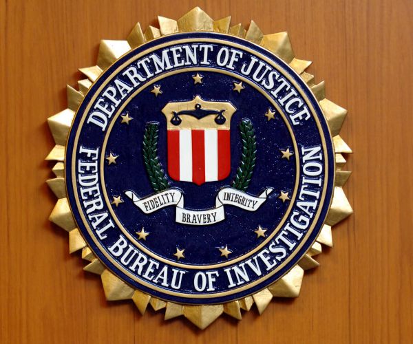 FBI Seeks Motive for Fiery Van Crash at California Air Base