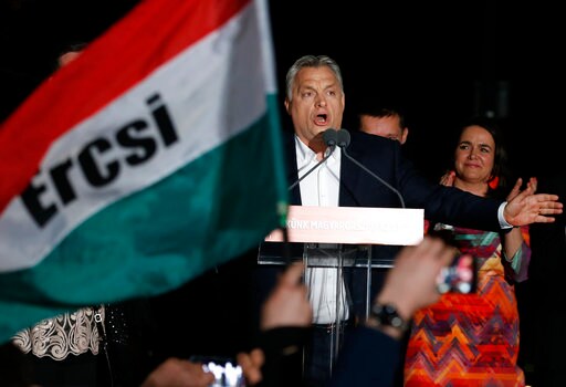 The Latest: Conservative German Minister Congratulates Orban