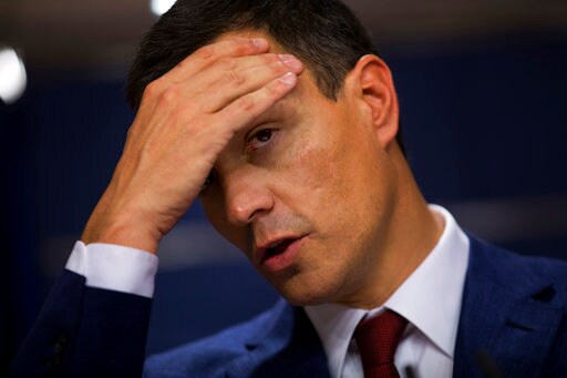 The Latest: Spain's Socialists Reinstate Ousted Leader