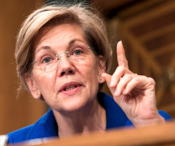 elizabeth warren points and speaks during a senate committee hearing