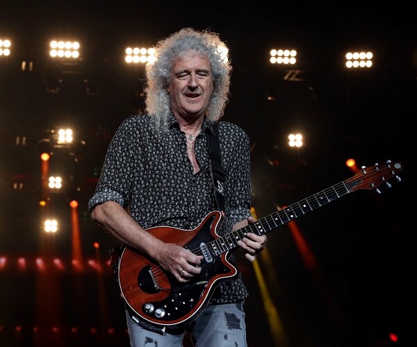 brian may plays guitar onstage