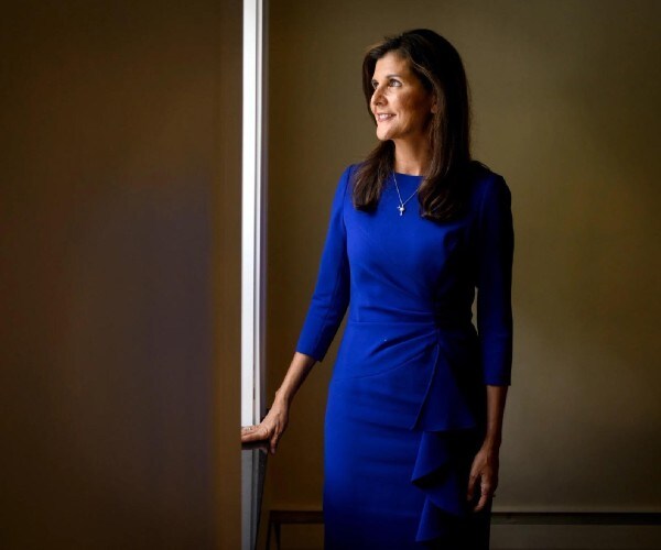 nikki haley looks out a window