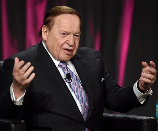 adelson in a suit and striped tie