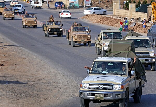 Kurdish Peshmerga Forces Cross Into Syria's Besieged Kobani