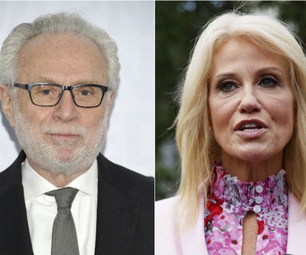 wolf blitzer is shown in a split frame phone with kellyanne conway on the right