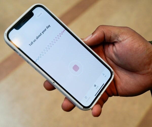 smartphone with Joy app on screen
