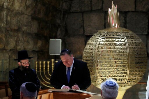 The Latest: Trump Says Israel Sovereign over Golan Heights