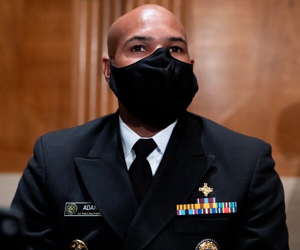 jerome adams sits in senate hearing