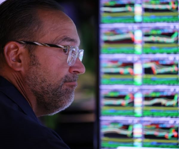 Wall Street Ends Lower as Global Central Banks Raise Rates