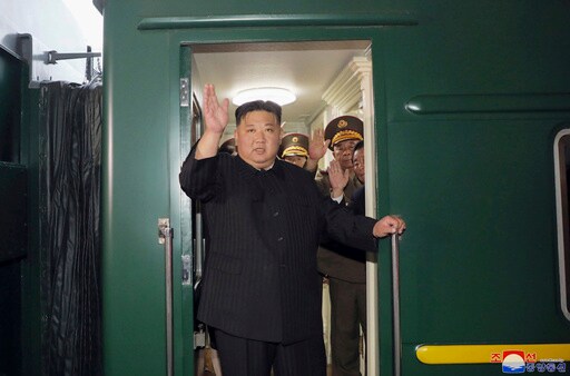 Kim Jong Un Rides His Trademark Green Train to China. He Also Has a Plane, Limos and White Horses