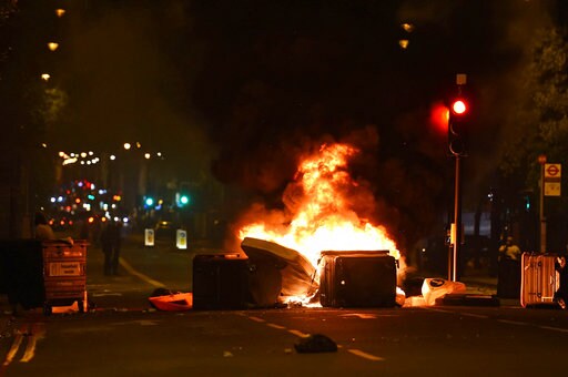 Protesters Clash with London Riot Police over Man's Death