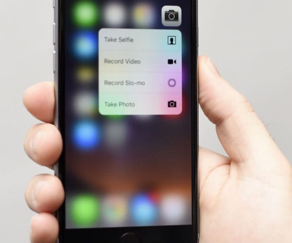 a person holds a cell phone