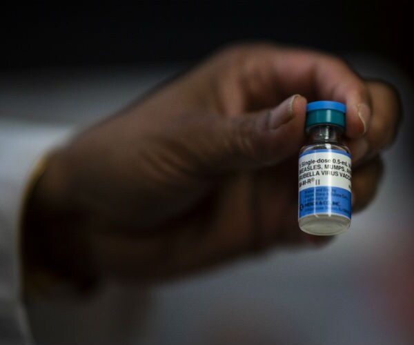 Measles: A Shot to Your Arm or a Shot to Your Wallet