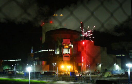 Greenpeace Activists Light Fireworks at French Nuclear Plant