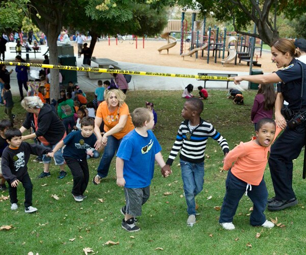 Teacher Hostage at Riverside School Safe, Suspect Killed