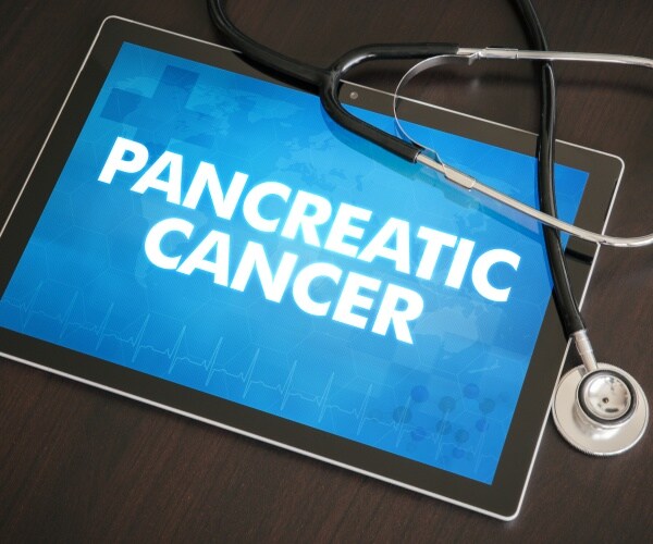iPad screen says Pancreatic Cancer, stethoscope
