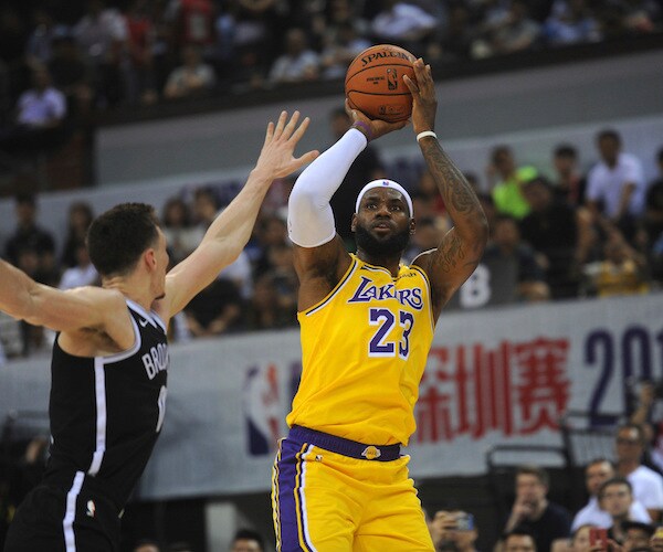 LeBron James Gives Shenzhen a Show But No Words in Nets Matchup