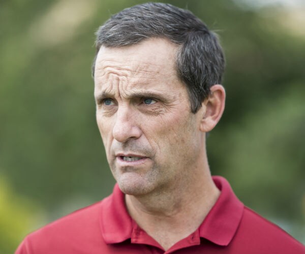 gop rep. steve knight of california looks forward in a red polo shirt