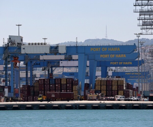 containers and cranes on a dock 