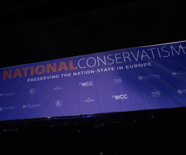 a sign reading national conservatism