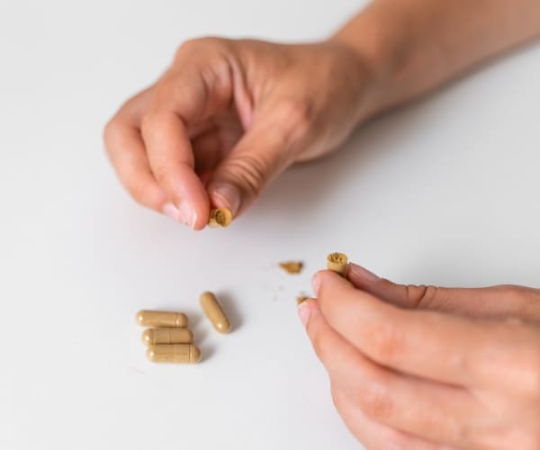 person microdosing psychedelic from capsules