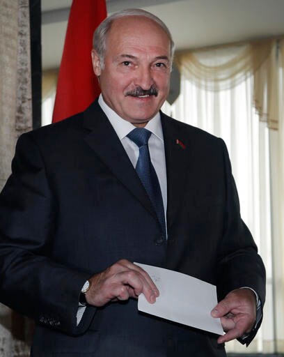 Belarusians Cast Ballots for Parliament, Doubt Change