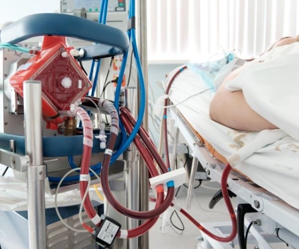 person on bed in emergency room