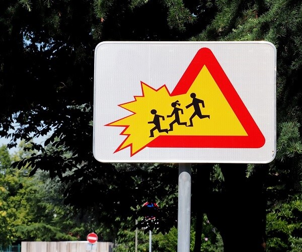 Mother Killed Trying to Save Kids From Car in School Lot