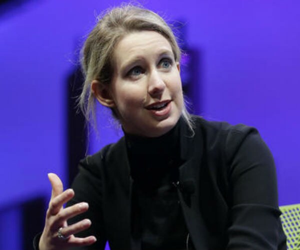 Feds Ban Theranos CEO Holmes from Running Lab for 2 Years