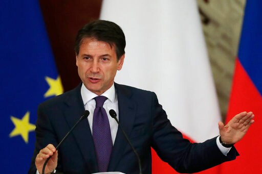 Italy PM Welcomes S&P Move to Maintain Rating, Lower Outlook