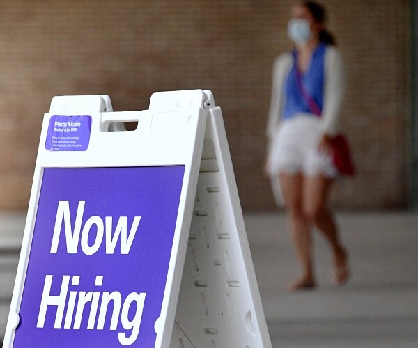 now hiring sits outside store