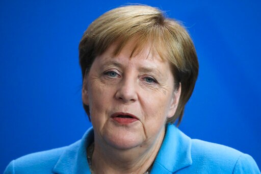 Germany's Merkel Sits for Anthems after Shaking Episodes